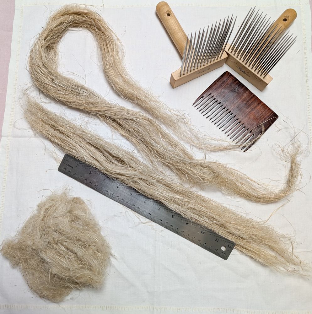 Another view of the first photo with a ruler added for scale. The ball of short tow fibers is roughly 7 inches in diameter. The medium fiber bundle is approximately 18 inches long, and the long bundle is a little more than 2 feet in length.